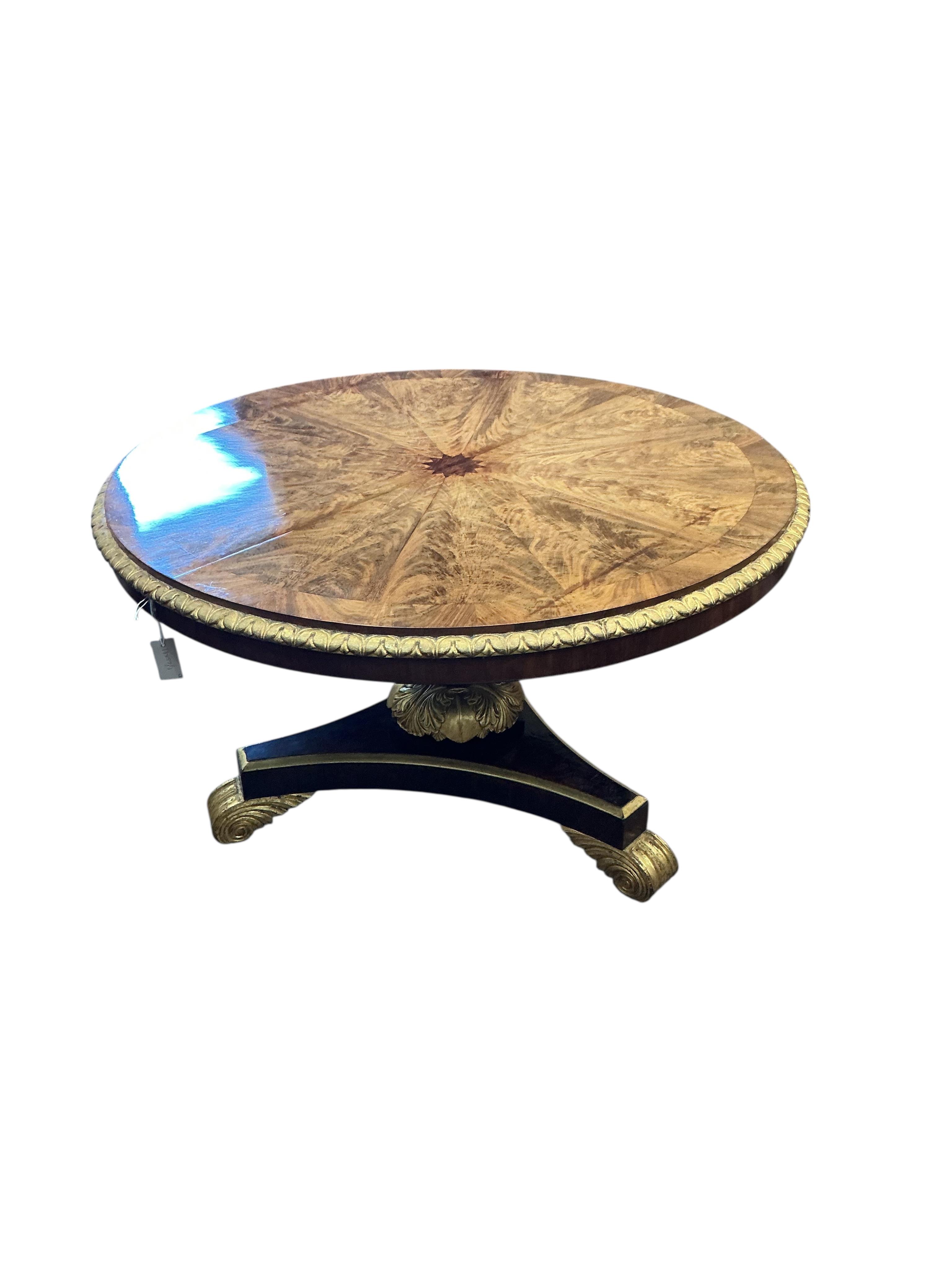 A William IV and later segmental mahogany veneer, parcel gilt circular tilt top breakfast table, diameter 120cm, height 72cm and a harlequin set of six later painted balloon back chairs